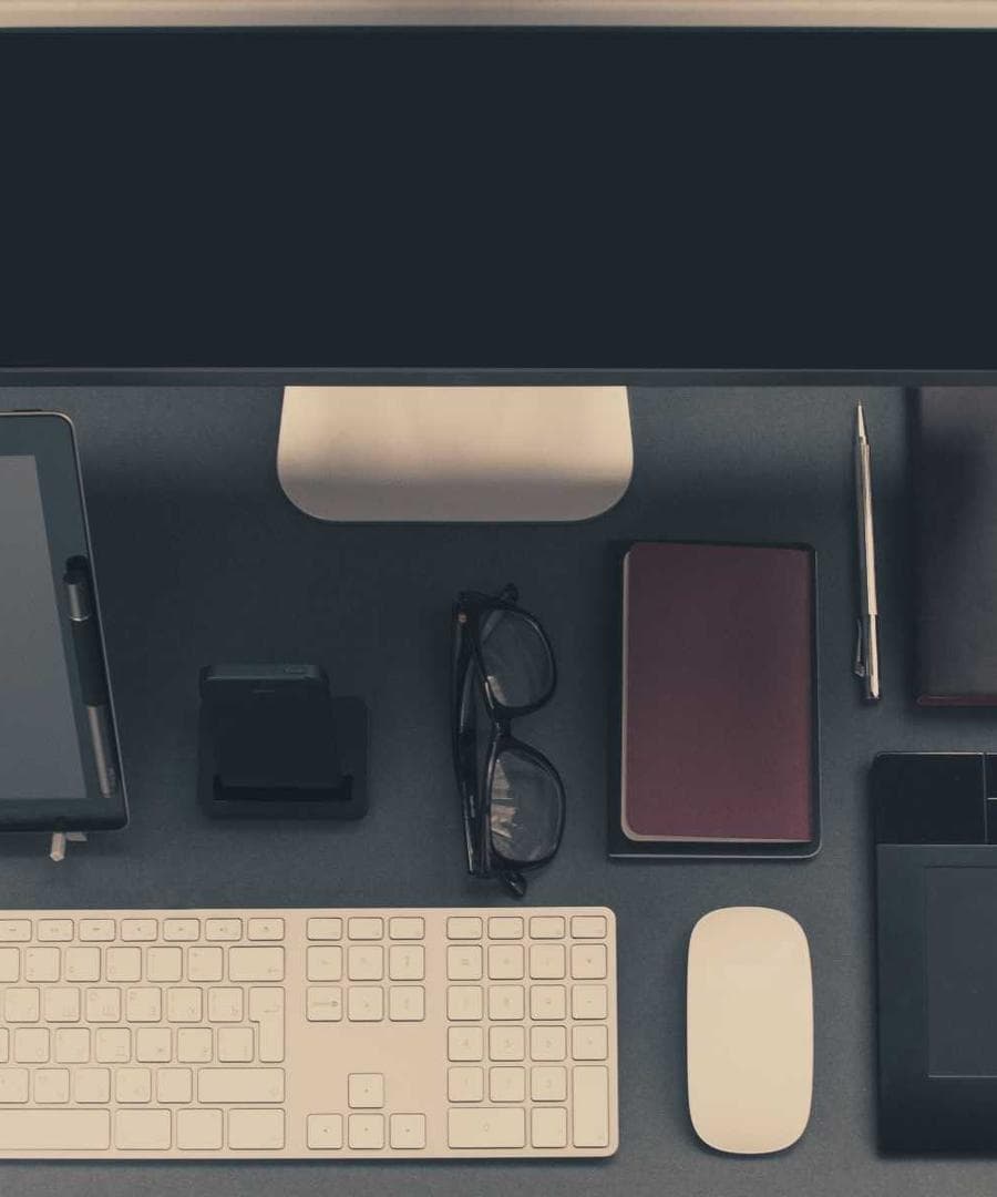 A workstation kept tidy while the software does the talking